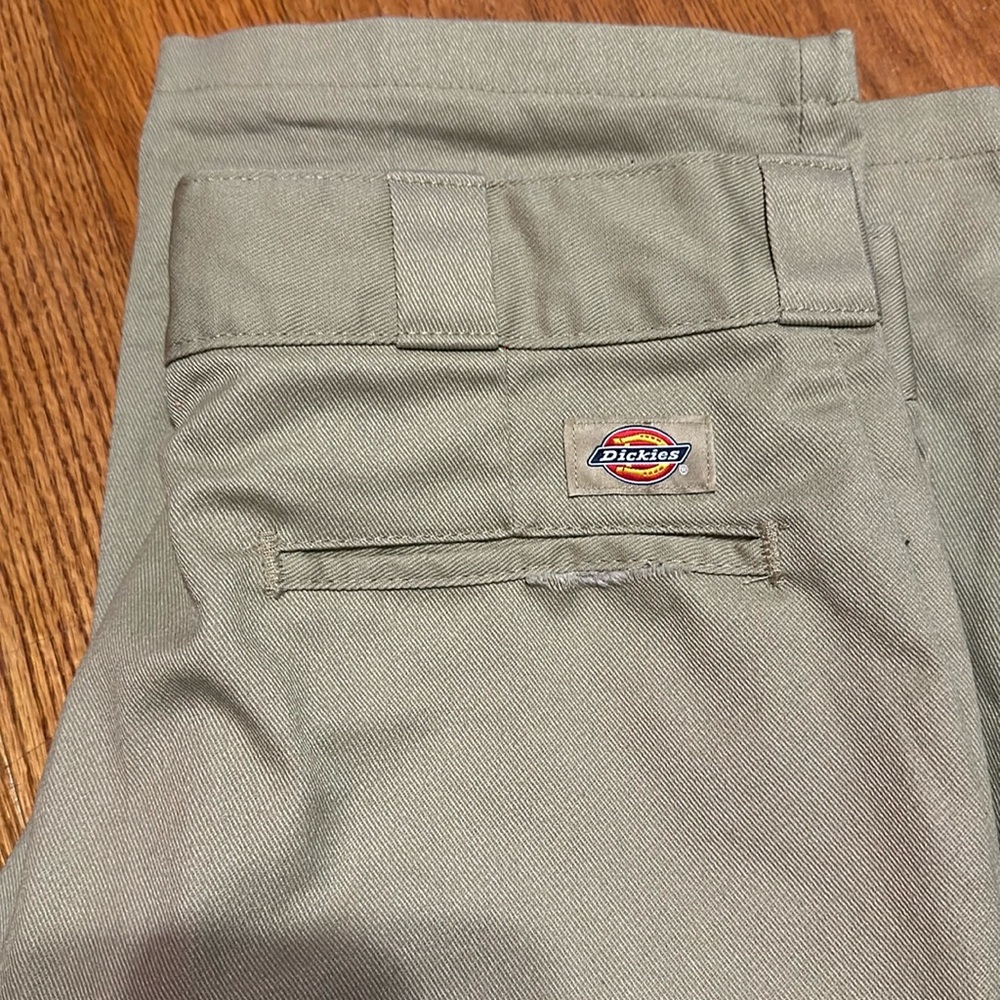 Tan Dickies pants. Fits a s/m waist. New condition but have been worn once.